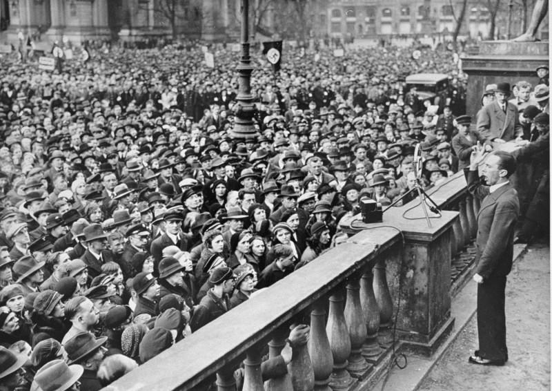 Adolf Hitler speech Nazi rally Germany crowd propaganda Holocaust era